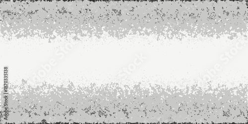 A grayscale image featuring a textured horizontal gradient and white space