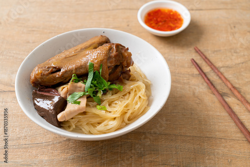 Photography dried noodles with braised duck in white bowl