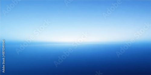 Blue sky and clouds over the calm summer sea with sun reflection on the light blue water
