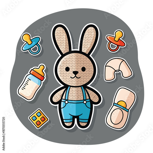 A cute bunny surrounded by baby items on gray