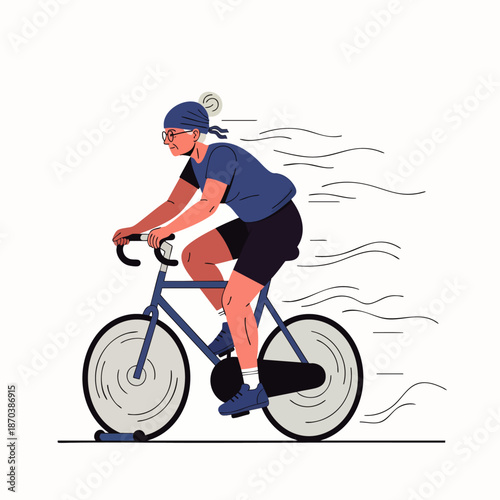 Senior woman cycling indoors on a stationary bike, exercising and staying fit