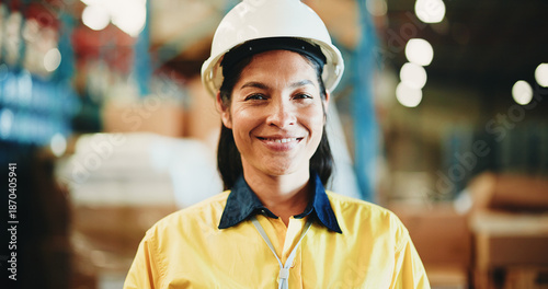 Tableau sur toile Happy woman, portrait or contractor with helmet in warehouse for shipping, logistics or storage