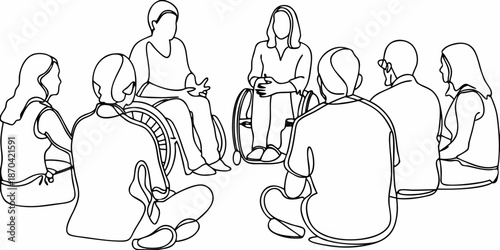People sitting in a circle including a person using a wheelchair