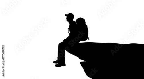 Silhouette of a backpacker sitting on a cliff edge, contemplating the distance