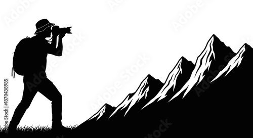 Silhouette of a photographer capturing the beauty of nature's majestic mountain range backdrop in