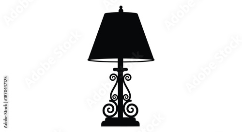A striking black lamp design with ornate detailing stands out as a bold silhouette