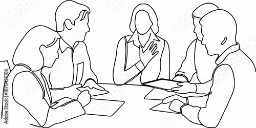 A group of people engaged in a meeting or discussion at a table