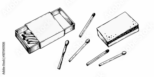 An open matchbox with several matches scattered around it