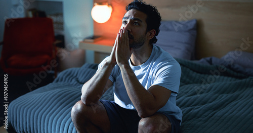 Fotografia Night, stress and thoughtful man with anxiety, mental health and prayer for insomnia in bedroom