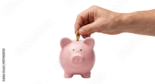 Tableau sur toile Male hand putting gold coin into pink piggy bank