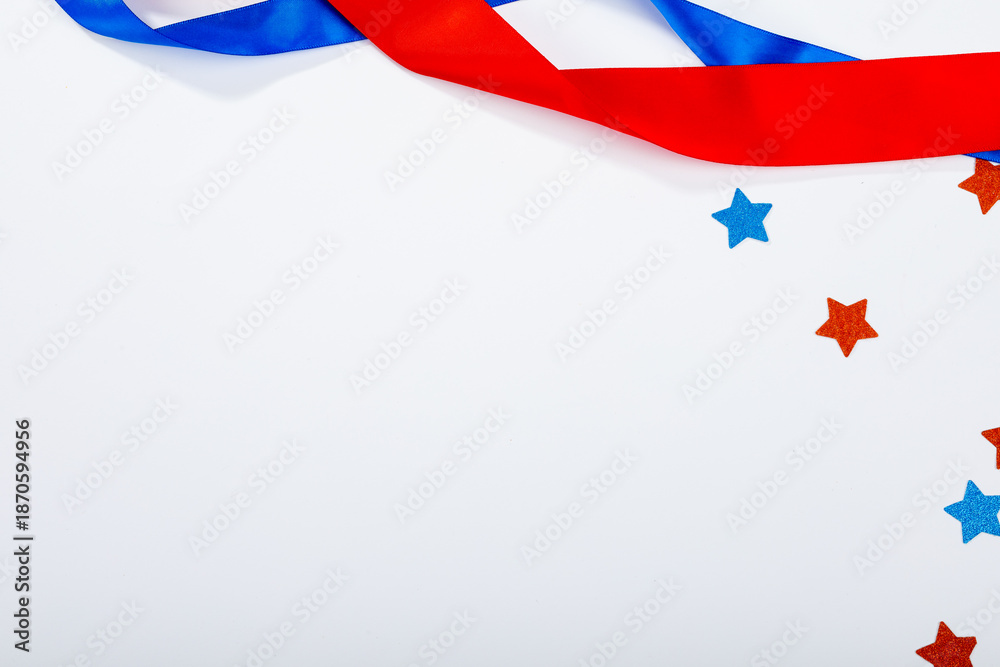 Fototapeta premium Red and blue stars and ribbons by copy space making them usa flag combination on white background
