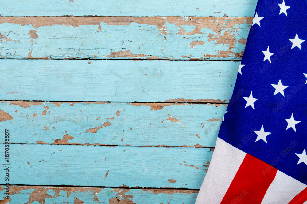 Naklejka premium Usa flag on blue wooden wall with copy space