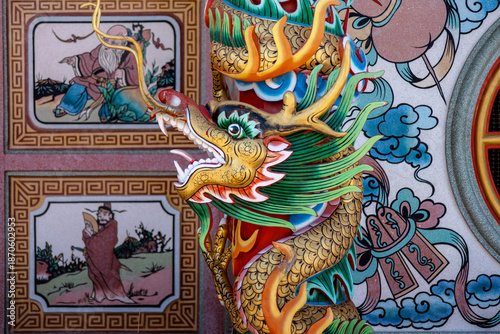 Wallpaper Mural Image of displays an ornate dragon sculpture on  pillar within a Chinese shrine. Image of displays an ornate dragon sculpture on  pillar within a Chinese shrine. Dragon is facing to the left. Torontodigital.ca