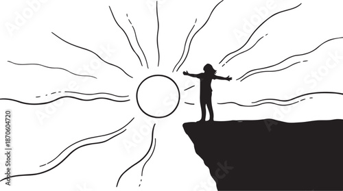 Silhouette of a person standing on a cliff