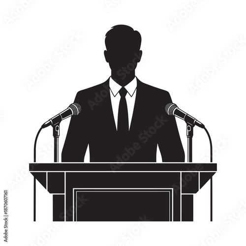Silhouette of a man in a suit speaking at a podium