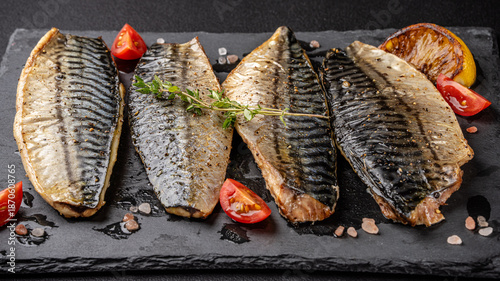 Fotografi Grilled Mackerel Fillets On Dark Slate