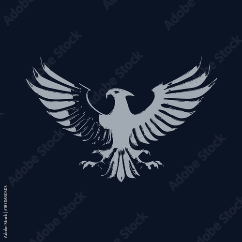 Stylized grey eagle with spread wings flying, an abstract bird of prey graphic design element or icon on a dark background