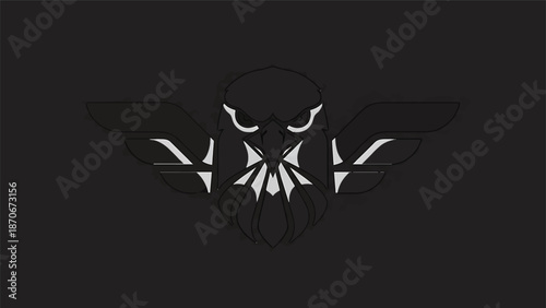 Dark silhouette of an eagle with spread wings, artistic design.