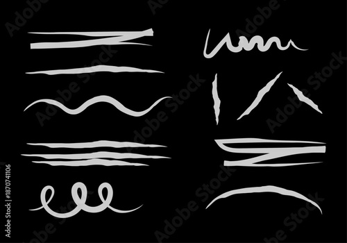 Colección de trazos y líneas blancas estilo pincel de tiza sobre un fondo negro sólido