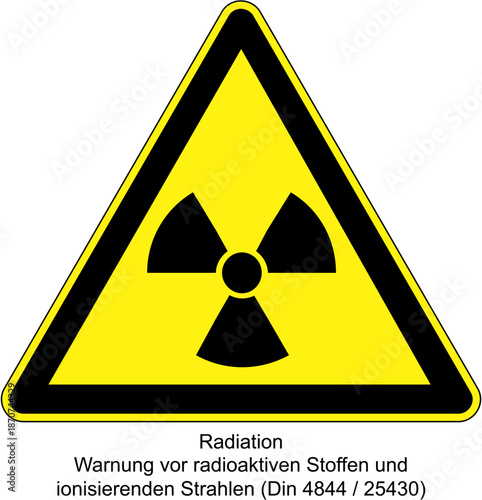 A yellow and black radiation warning sign with a trefoil symbol on a white background