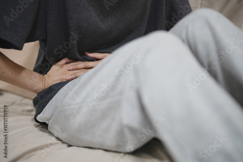 Canvastavla Flatulence ulcer, asian young woman, girl hands in belly, stomachache from food poisoning, abdominal pain and digestive problem, gastritis or diarrhoea