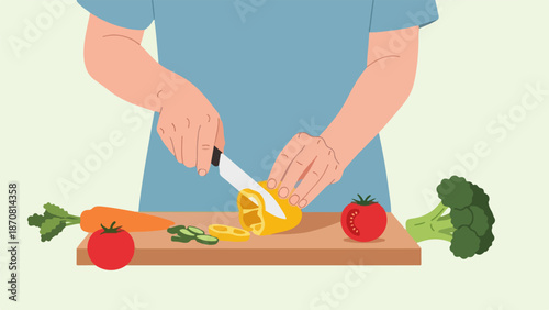 Person slicing a bright yellow bell pepper on a wooden cutting board with fresh vegetables around