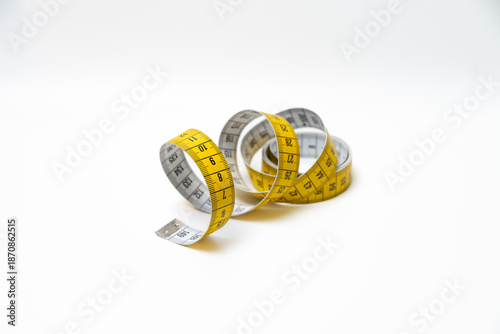Foto Yellow Taylor's Measuring Tape on a white background