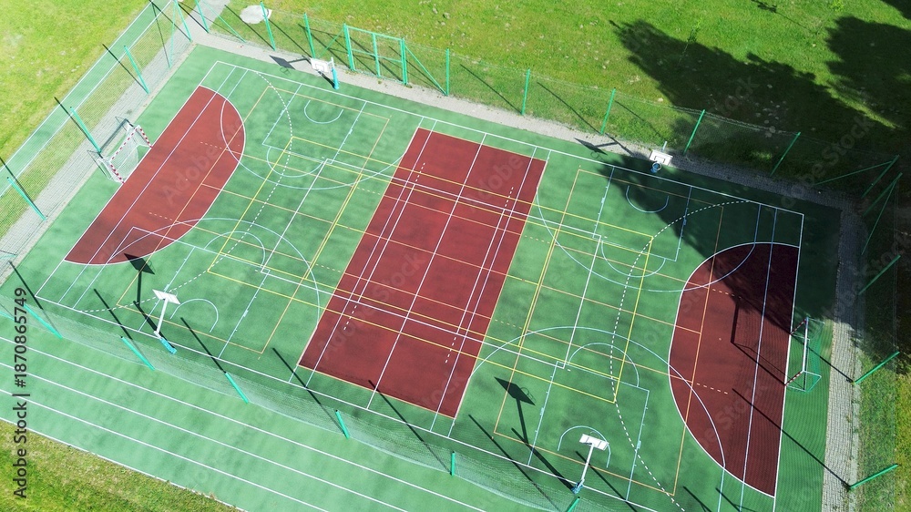 Obraz premium Mixed-use playground with basketball hoops