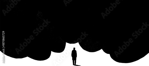 Silhouette of a person under dark clouds in black and white art