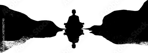 Silhouette of a person meditating by water with mountain reflections