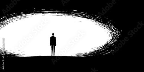 Silhouette of lone figure in abstract black and white space