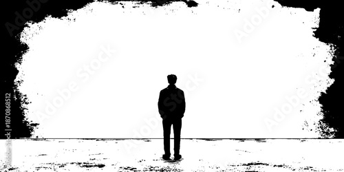 Silhouette of a lone male facing a vast blank canvas in minimalistic scene