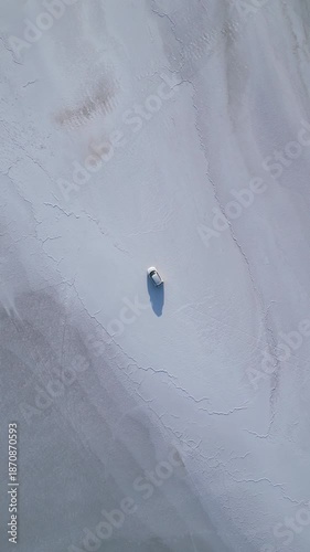 Top-Down Drone Shot of Car Centered on White Rann Salt Desert