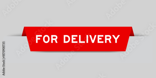 Red color inserted label with word for delivery on gray background