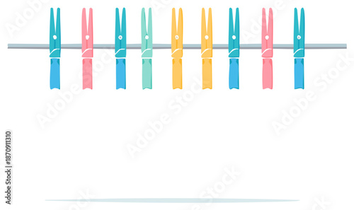 Vibrant plastic clothespins neatly arranged in a colorful row on a laundry line