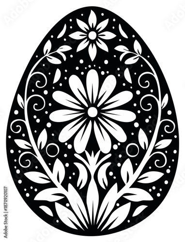 Black and white ornate Easter egg silhouette with floral and leaf pattern cutout design