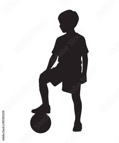 Silhouette of a young boy with a soccer ball, playing sports, active childhood, outdoor fun.