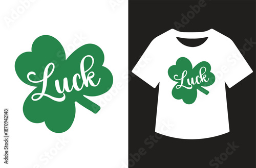 White cursive "Luck" text seamlessly formed into a shamrock clover shape on dark green background, shown isolated and printed on black T-shirt mockup. Stylish vector emblem ideal for St. Patrick's Day
