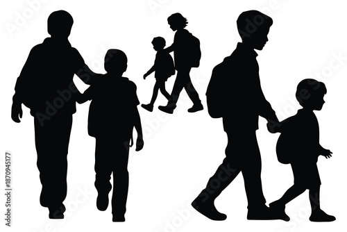 Silhouette of family walking together with children holding hands