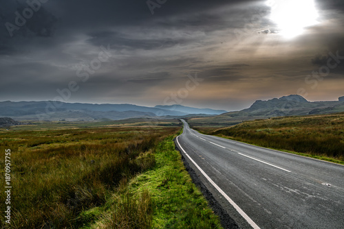 Abandoned Road Through Spectacular Rural Landscape Of Snowdonia National Park In North Wales, United Kingdom