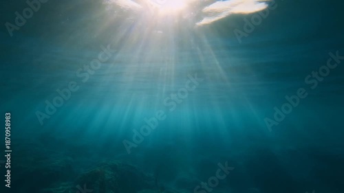 Underwater light beams abstract background