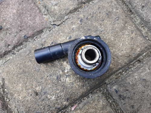 Broken Motorcycle Speedometer Gearbox on Pavement