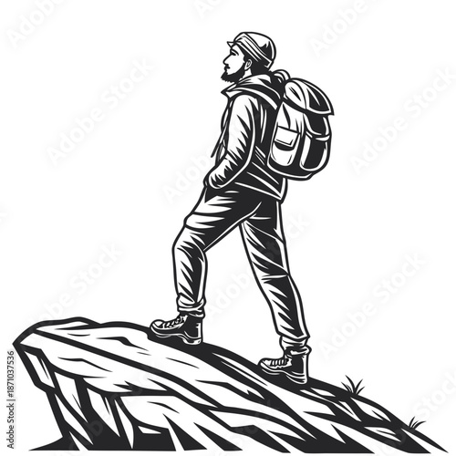 Backpacker standing on cliff outcrop looking away rock