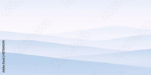 A breathtaking morning landscape featuring a mist-covered mountain valley under a blue sunrise sky where snow-capped hills and forest horizons meet the beauty of nature and clouds