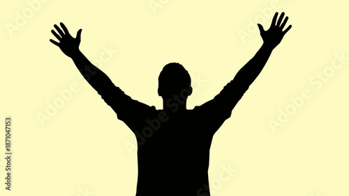 Silhouette of a person with arms raised in celebration.
