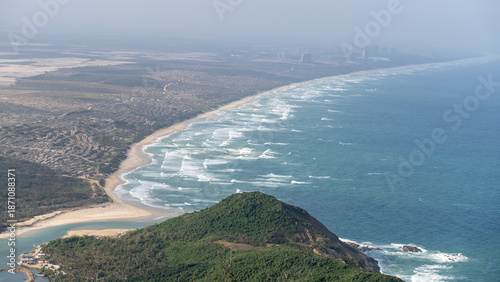 Aerial View of a Windy Bay with Rolling Waves