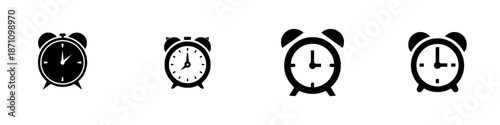 Different styles of alarm clocks showing time in black and white