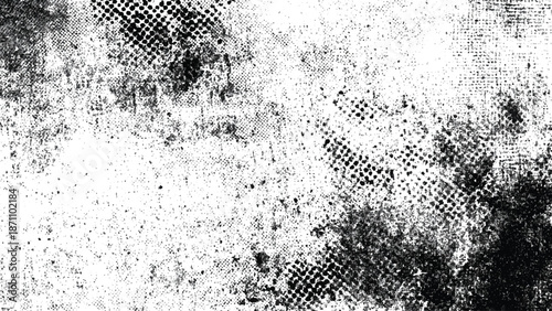 Grunge texture with black and white spots and dots on a worn surface abstract background