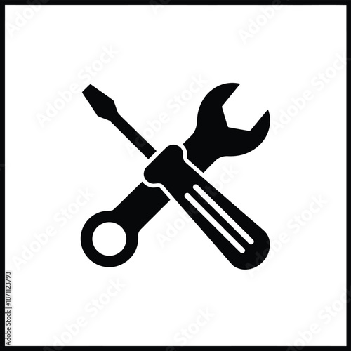 Screwdriver and wrench tools crossed in a simple black and white icon