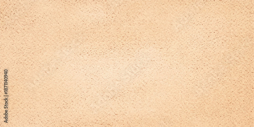 A vintage brown paper and leather texture background featuring a rough aged kraft surface with a grunge cardboard pattern and blank antique recycled material design
